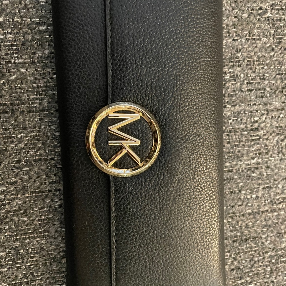 Michael Kors bag and matching wallet.